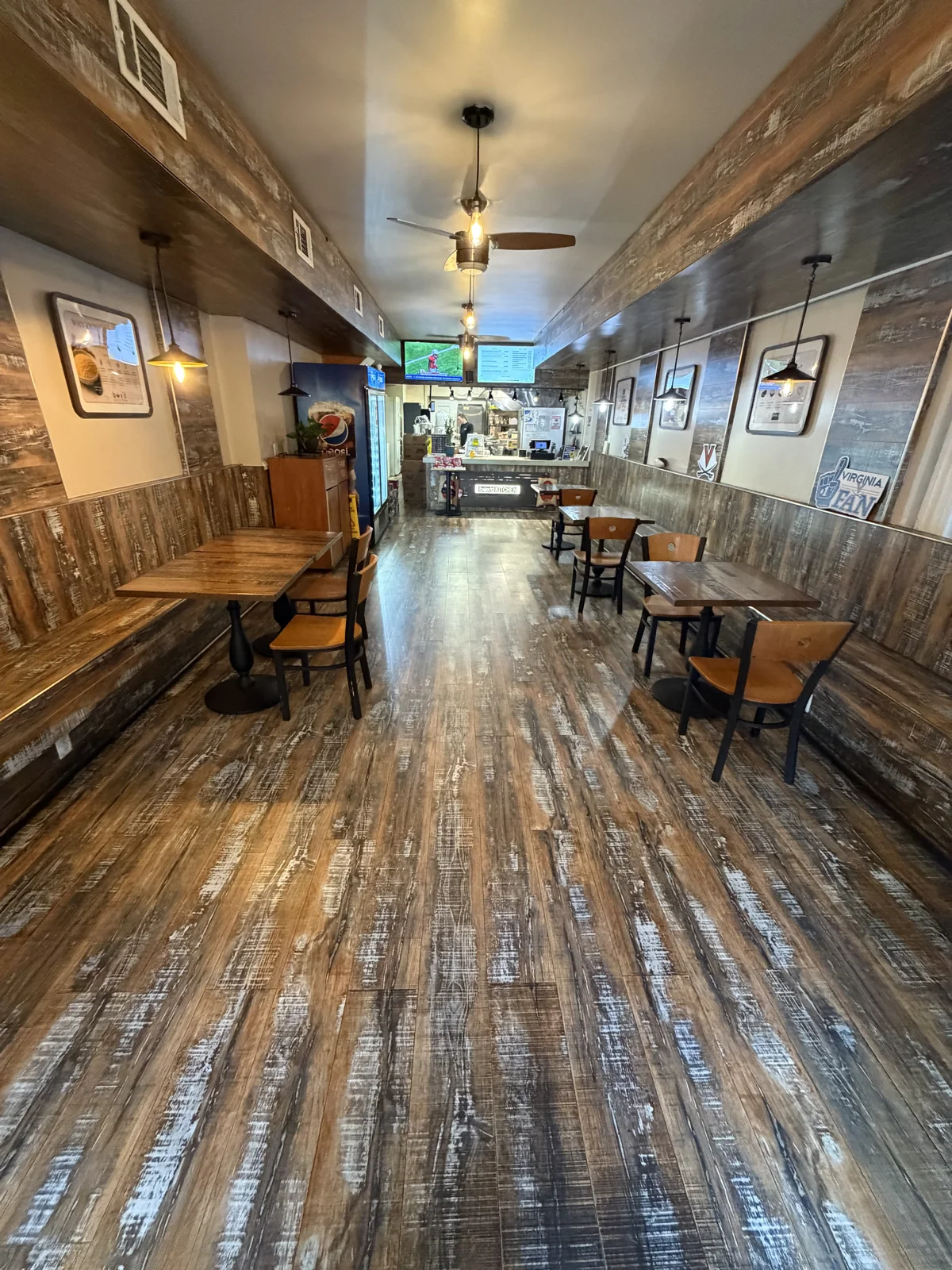 The dining room at Box’d Kitchen, looking toward the kitchen and ordering counter