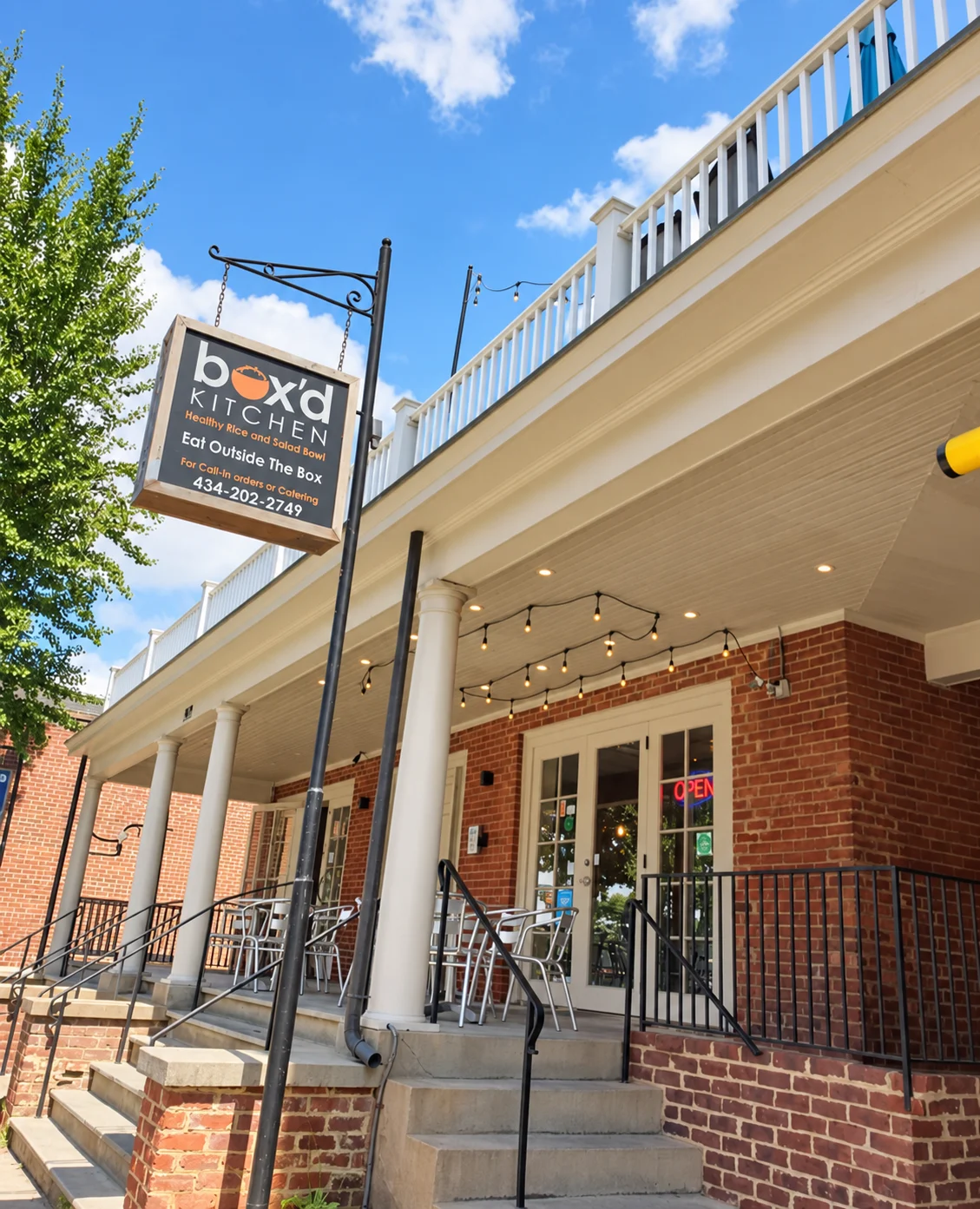 The Box’d Kitchen sign and porch on West Main Street