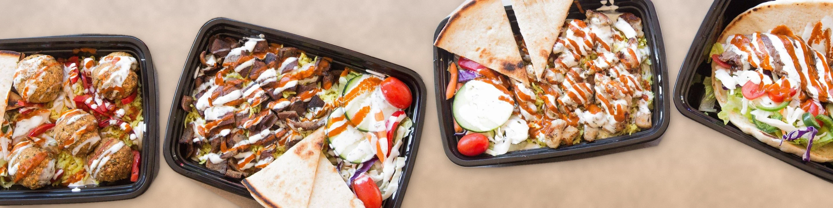 Box’d Kitchen falafel, lamb and chicken rice boxes and a pita wrap